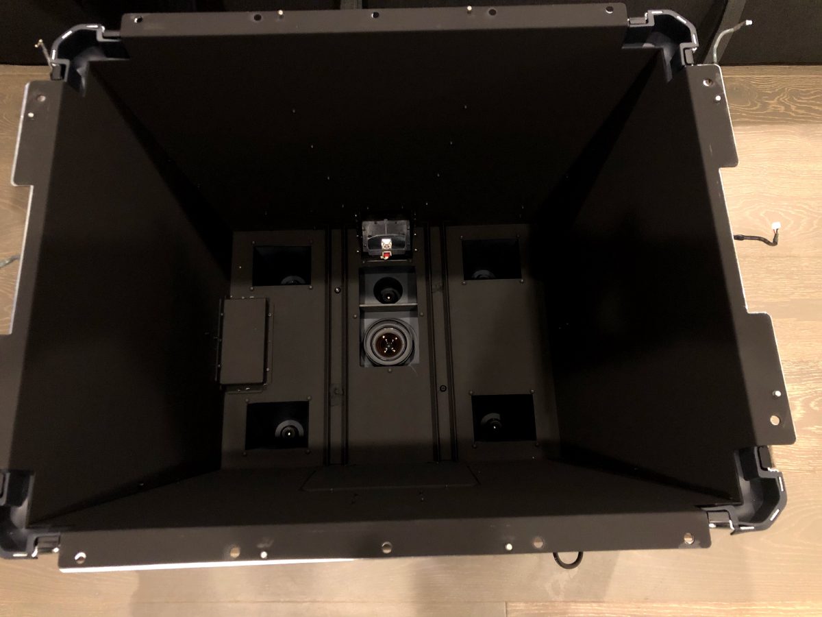 Inside the Surface projection chamber, showing the projector and five IR cameras